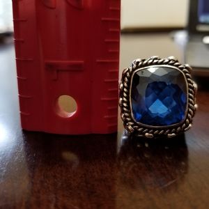 Ring with blue stone  as seen in picture, in sterling silver.
